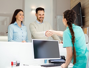 Couple meeting a receptionist